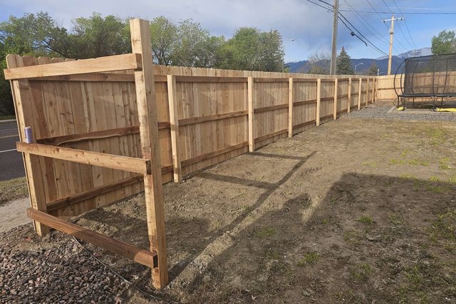 New cedar privacy fence installation at a Colorado Springs home
